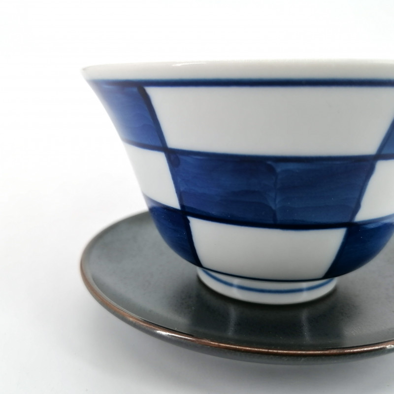 Japanese blue checkered ceramic cup and gray saucer