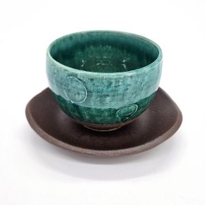 Japanese cup in blue clay and circle patterns with saucer